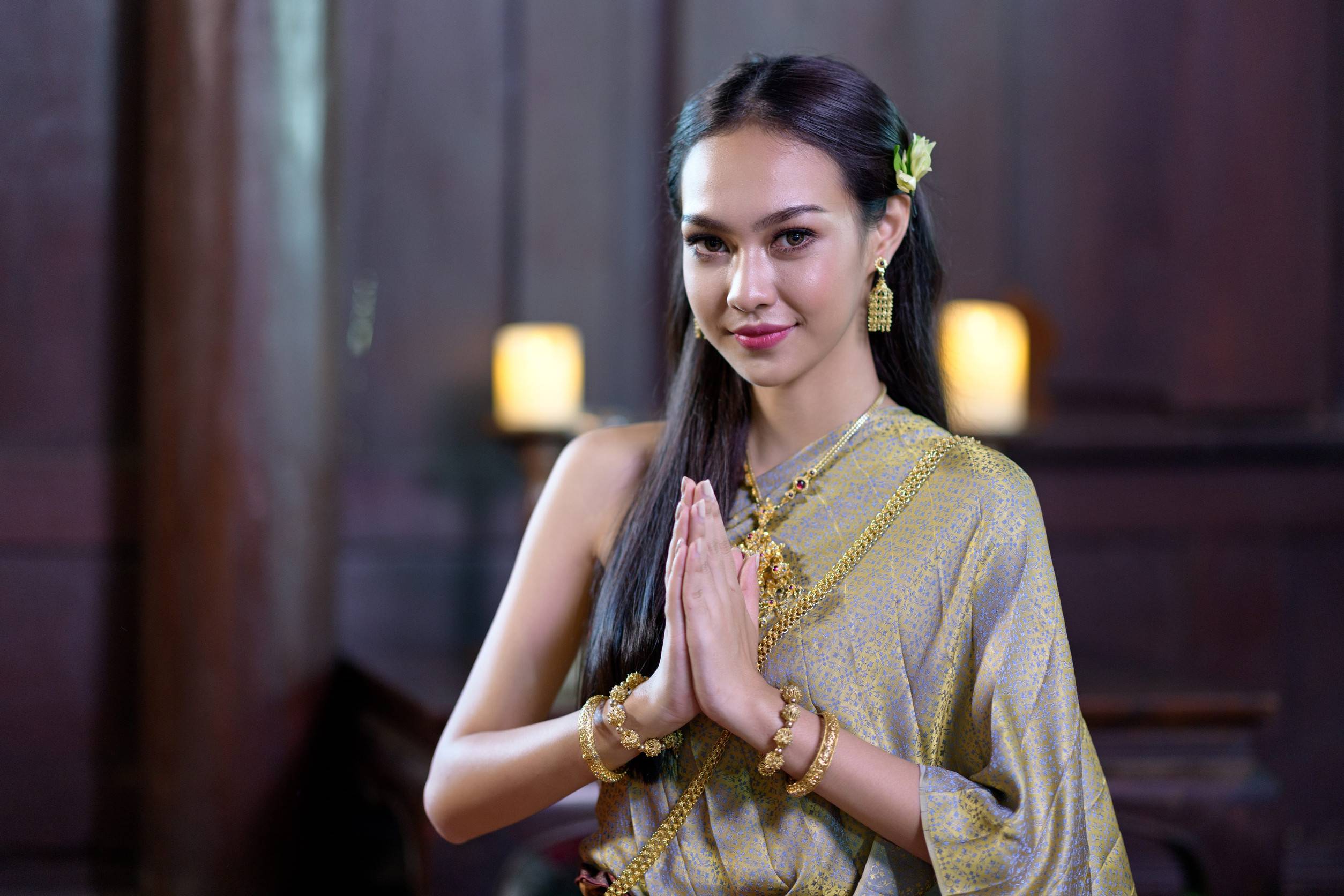 A Young Thai Woman Wearing A Traditional Thai Dress And Jewellery A Young Thai Woman Wearing A Traditional Thai Dress And Jewellery