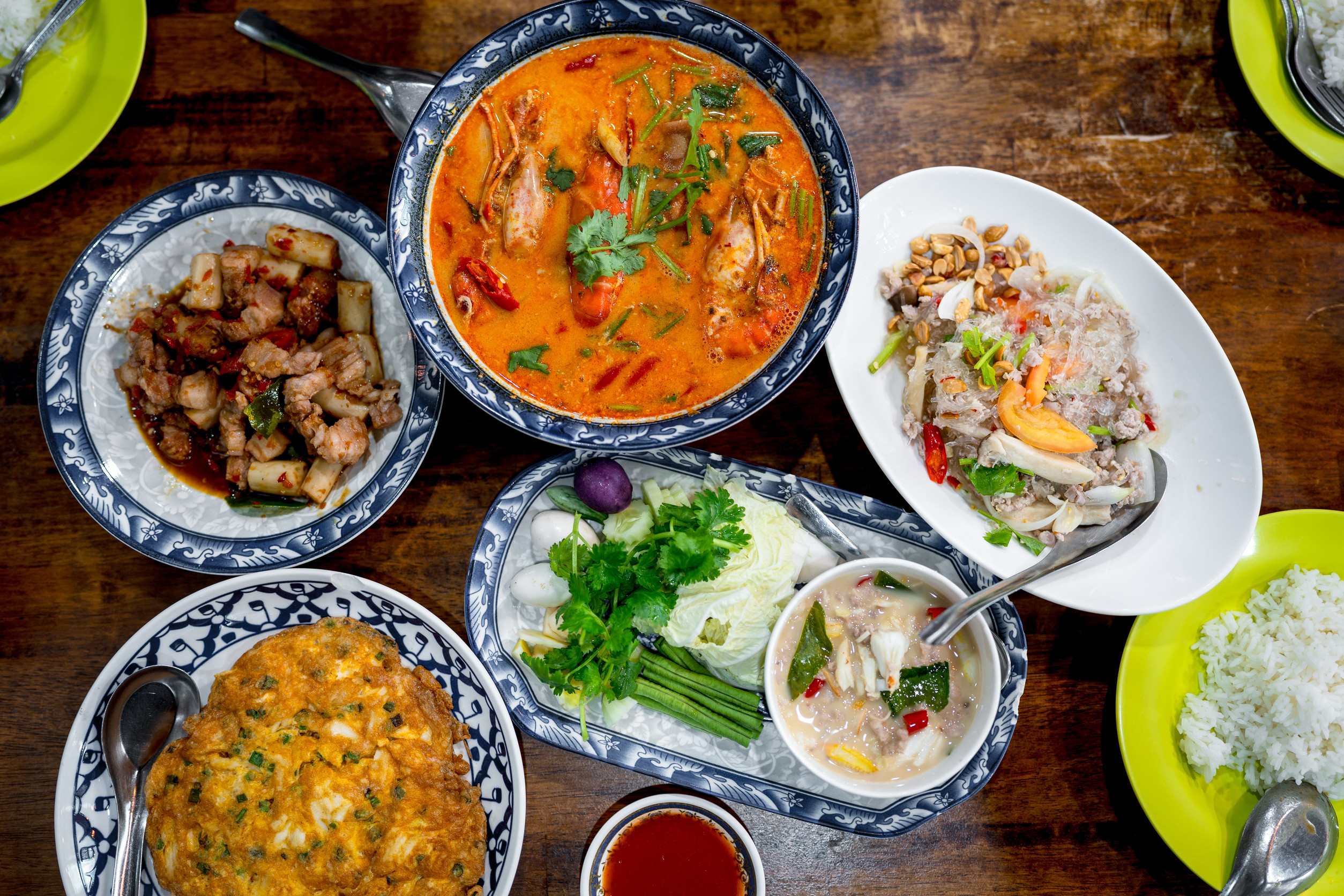 An Assortment Of Thai Food On A Table An Assortment Of Thai Food On A Table
