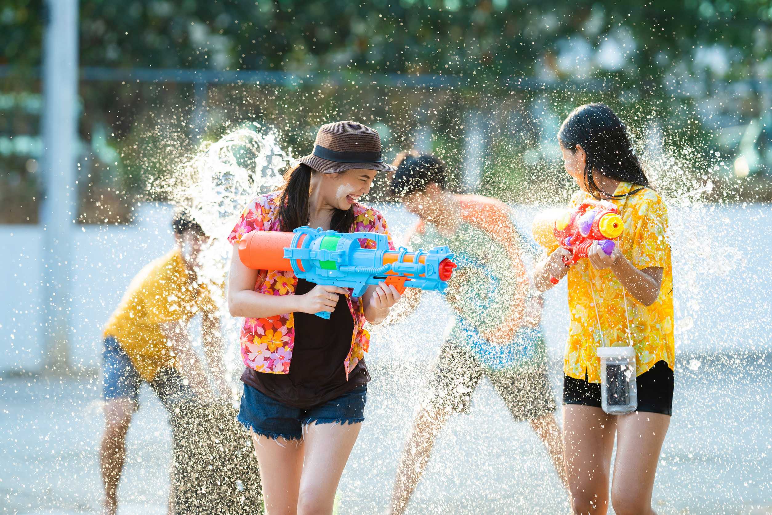 Asian People Are Using Water Guns Play Songkran Festival