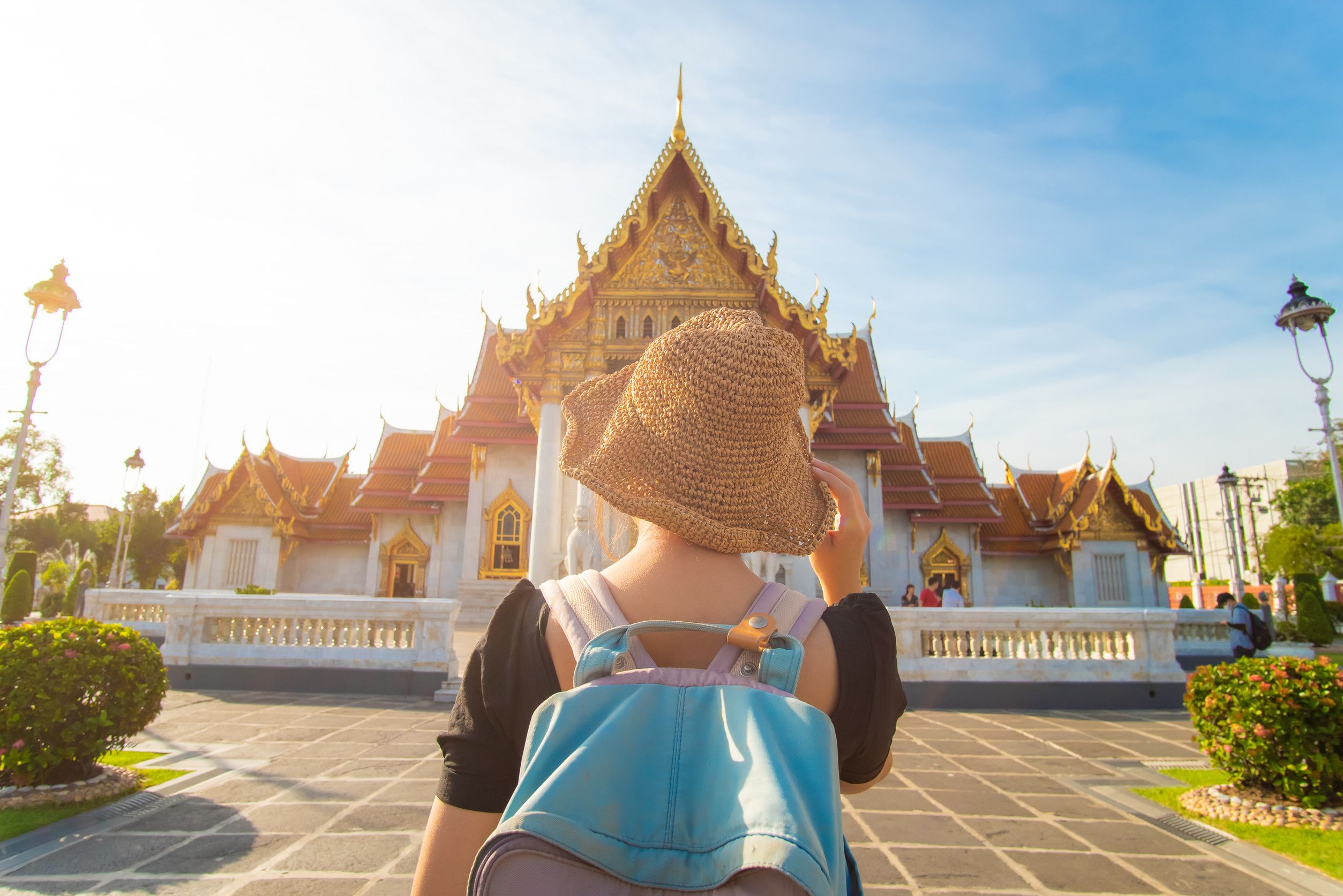 Backpacker Asian Women Travel In Busshist Temple Sunny Day In Bangkok Thailand Backpacker Asian Women Travel In Busshist Temple Sunny Day In Bangkok Thailand